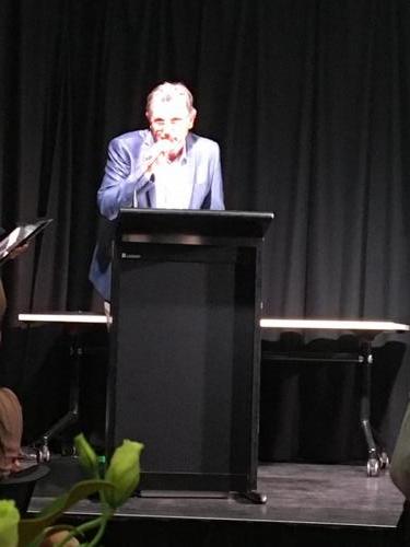 William giving thank you speech after being presented with award.